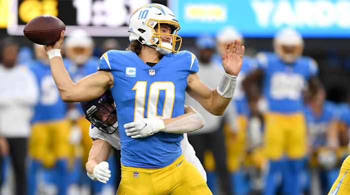 Nov 14, 2021; Inglewood, California, USA; Minnesota Vikings outside linebacker Nick Vigil (59) pressures Los Angeles Chargers quarterback Justin Herbert (10) to throw an incomplete pass in the second half of the game at SoFi Stadium.